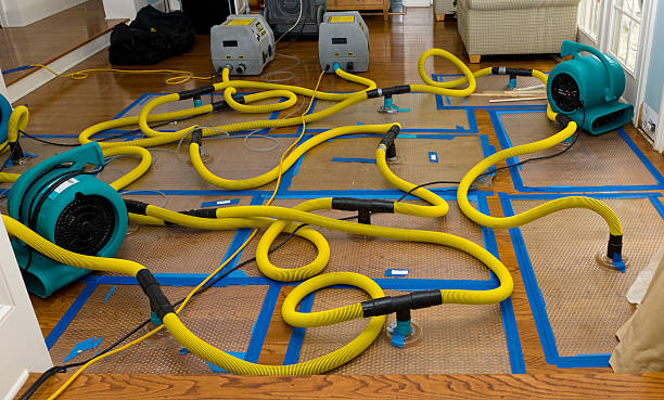 Professional Flood Damage Restoration technician working in Verona, PA